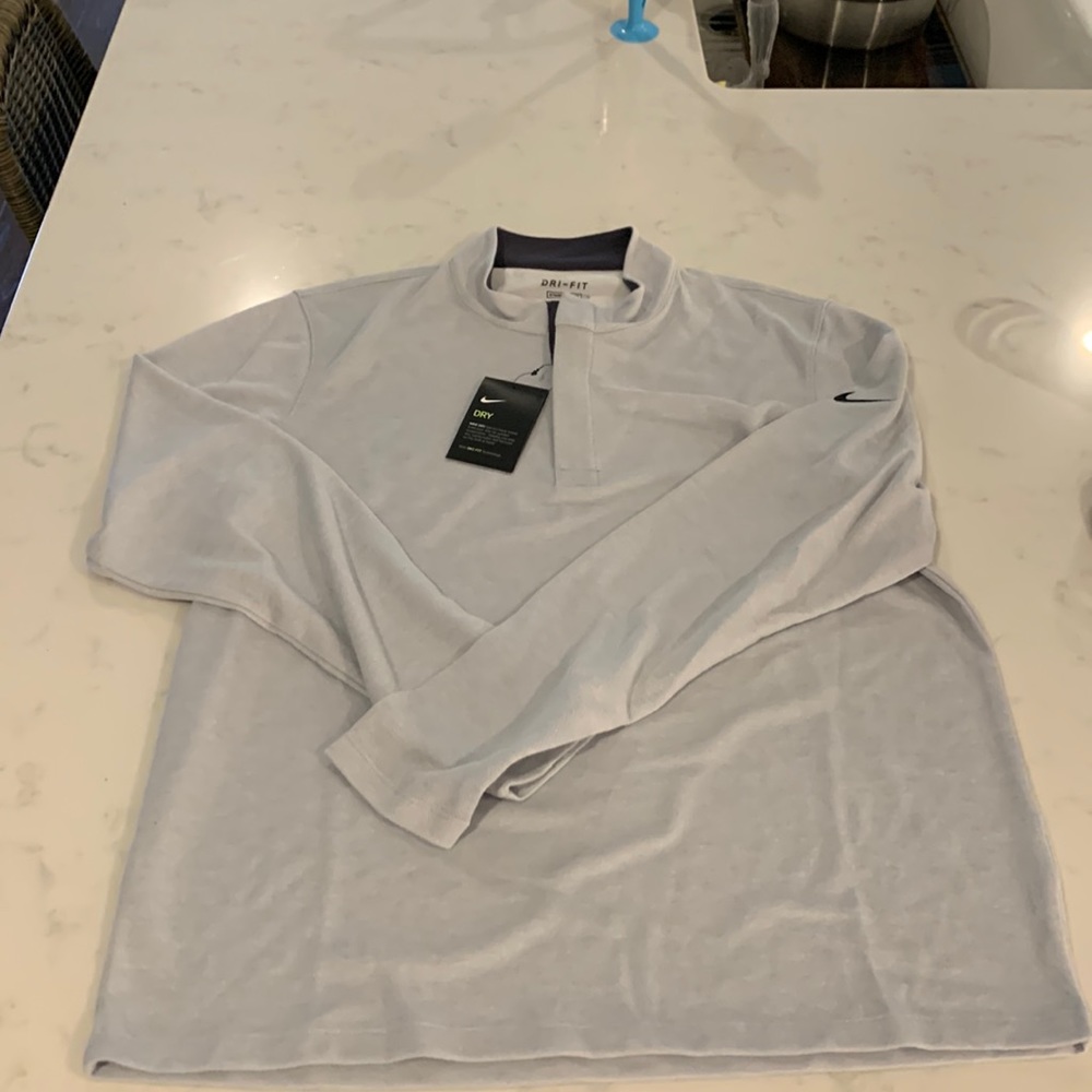 Men’s Nike standard fit quarter zip.  New with tags